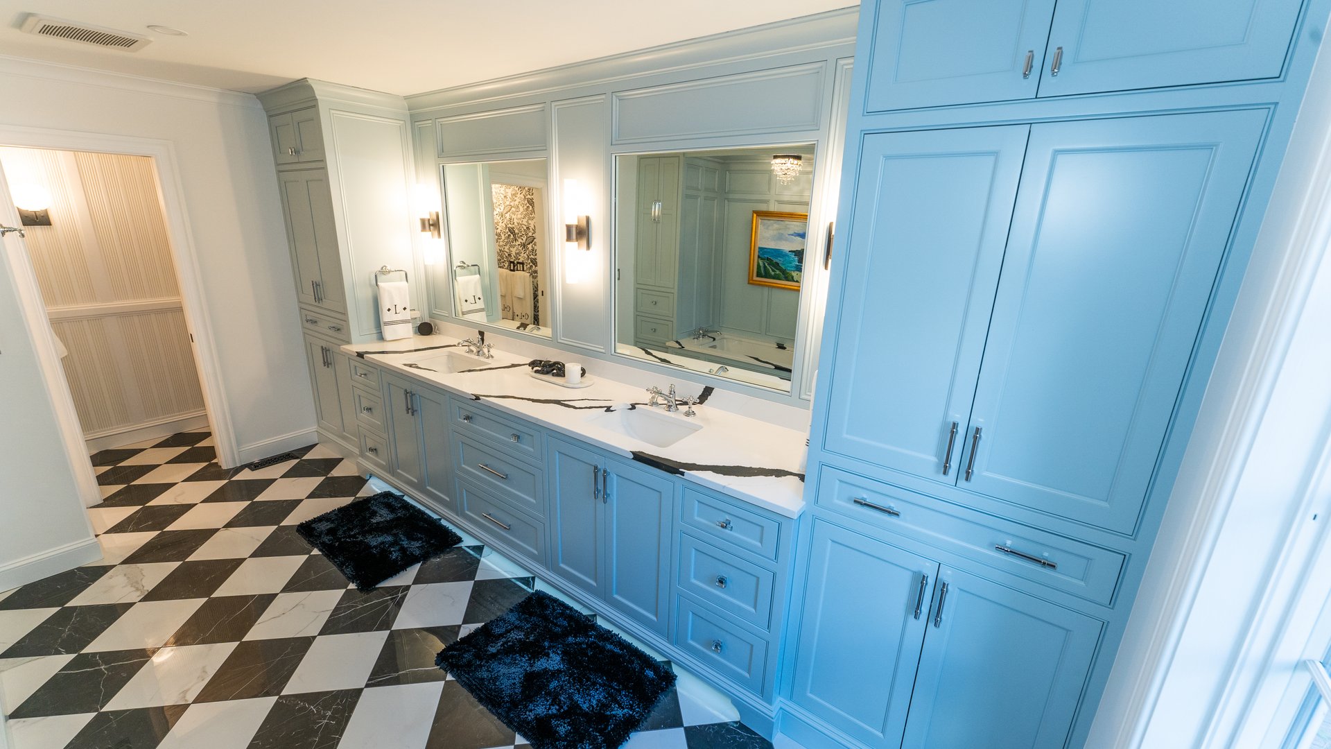 Custom black and white bathroom vanity cabinetry by Lewis Designs